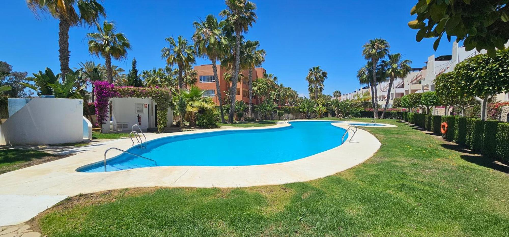 Apartamentos Paraiso Vera Playa: Beachfront with Private Pool and Garden Exterior photo